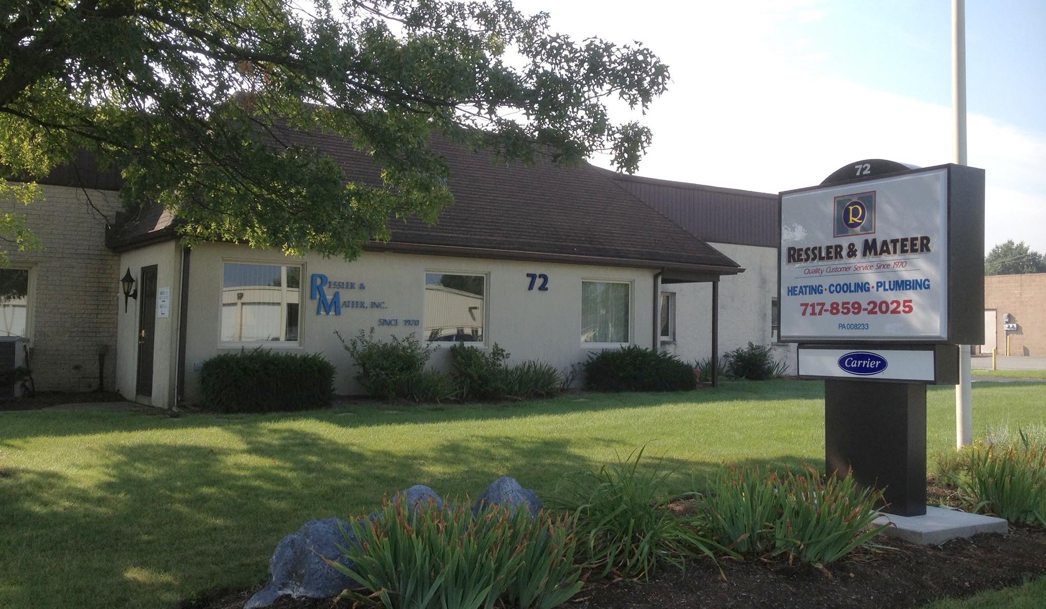 large office building with sign out front that says ressler and mateer